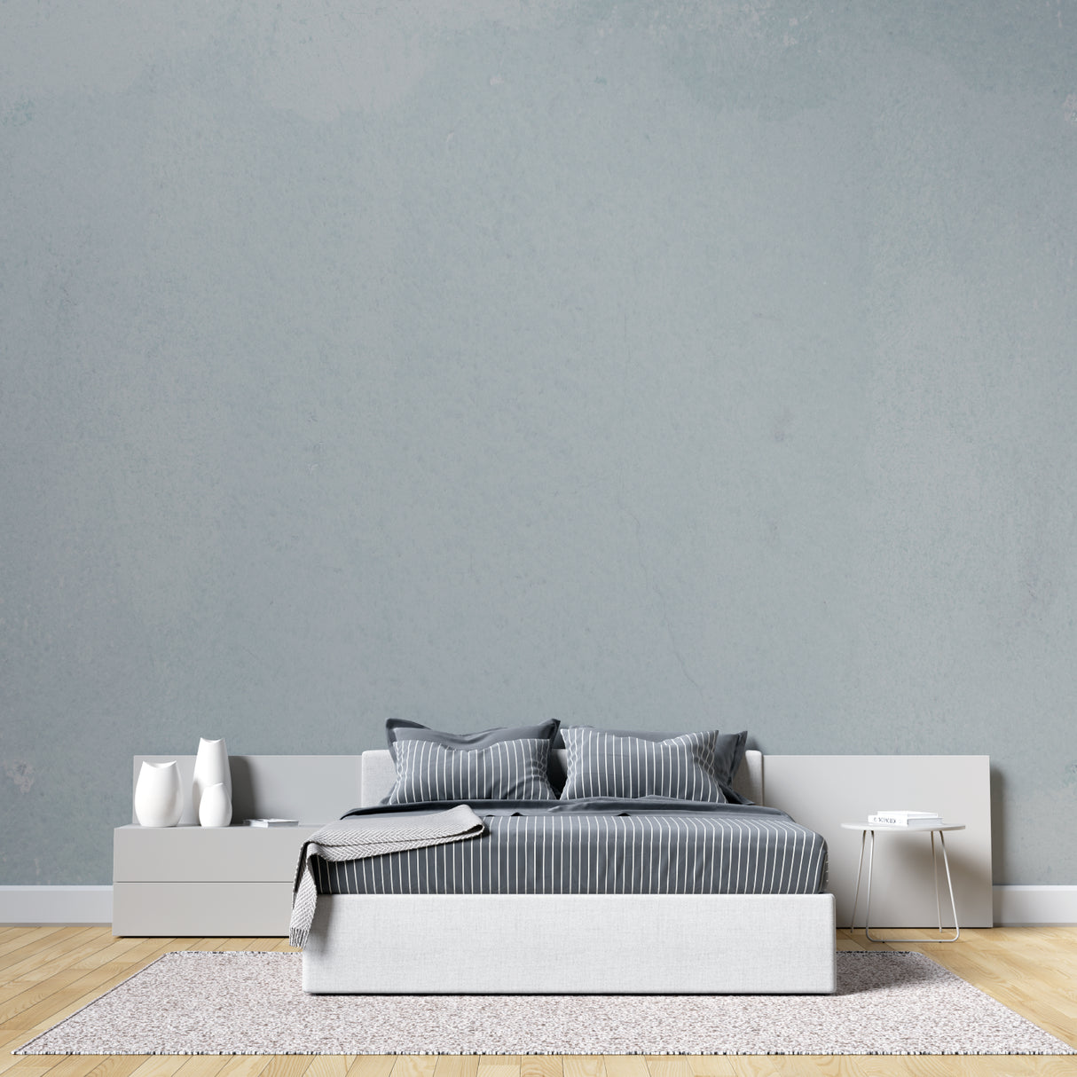 Grey textured wall mural creating depth in master bedroom