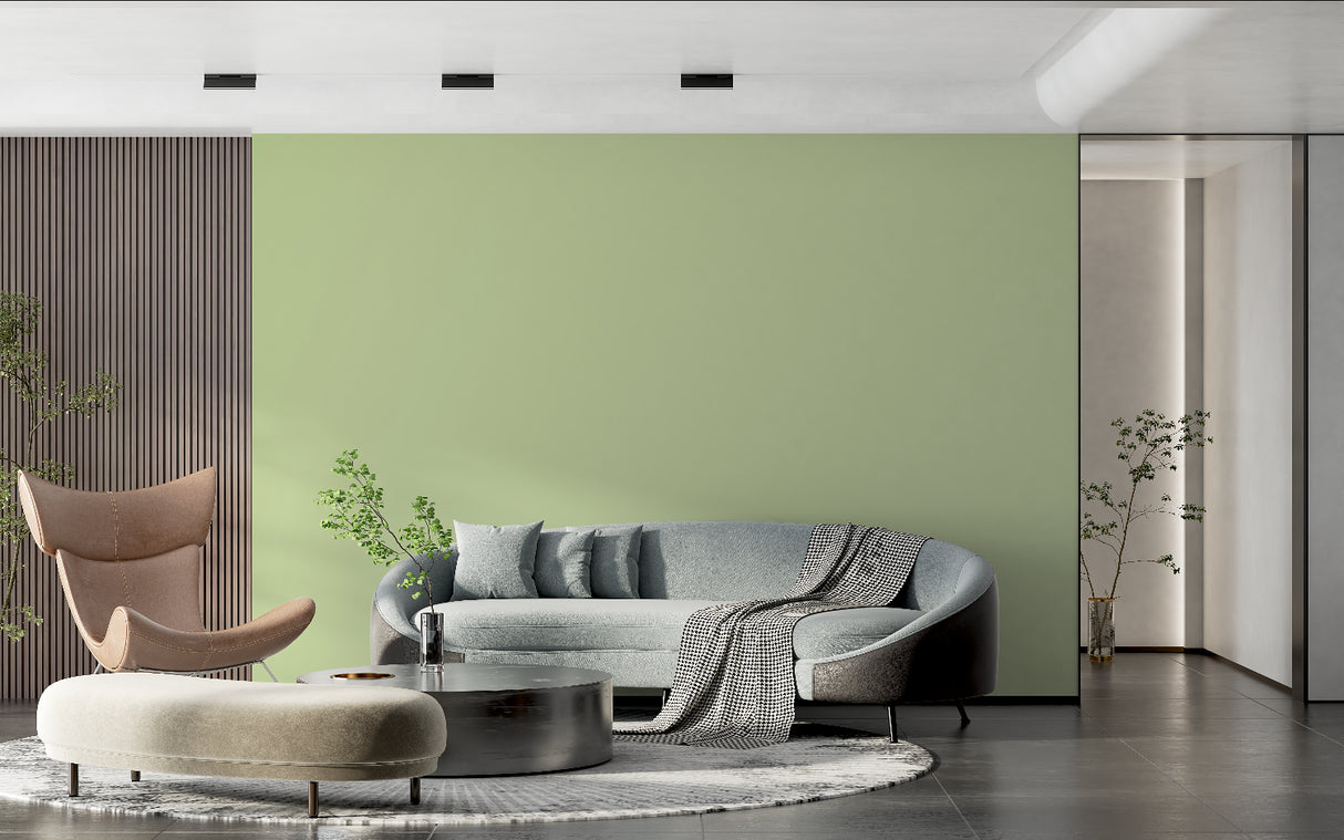 Modern green minimalist wallpaper in a bright Scandinavian living room setting with natural light