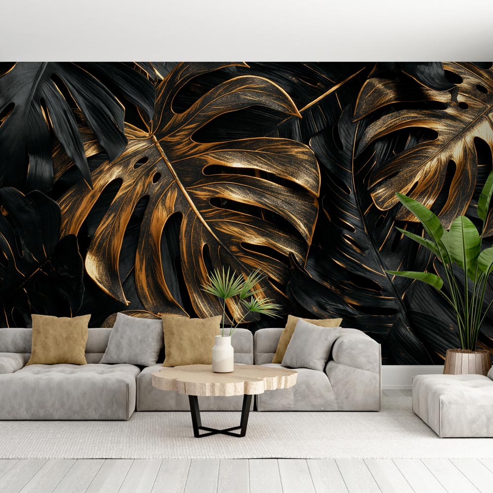 Black and gold Monstera leaf wallpaper creating drama in a modern living room with high ceilings