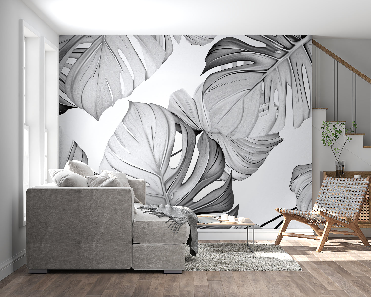 Black and white Monstera wall mural creating a focal point in a minimalist bedroom