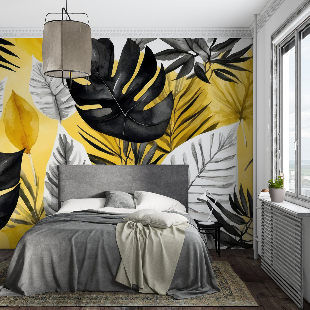Home office with dramatic black and yellow Monstera wallpaper making a bold statement wall