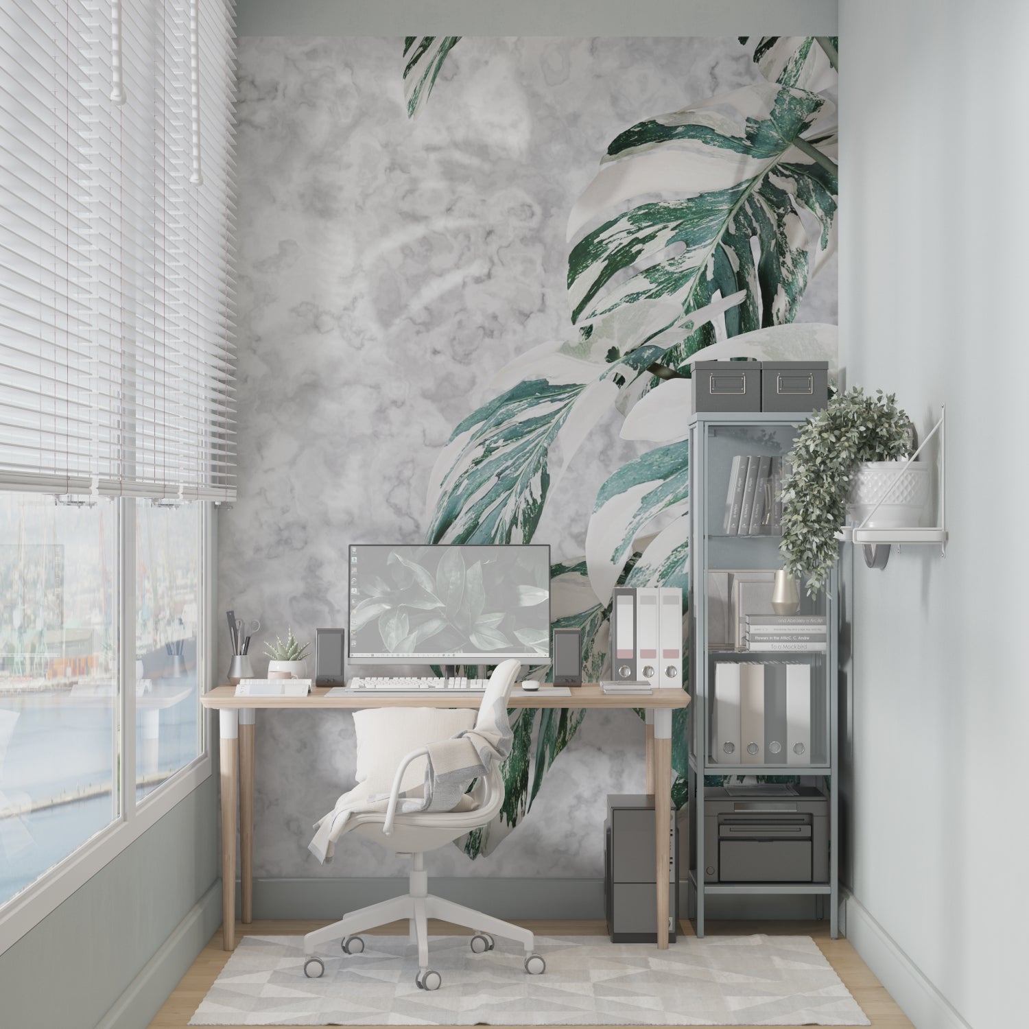 Home office featuring elegant Monstera leaf wallpaper with marble effect backdrop