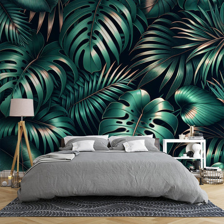 Monstera leaf wallpaper with gold accents creating a stunning backdrop in a modern living room with natural light