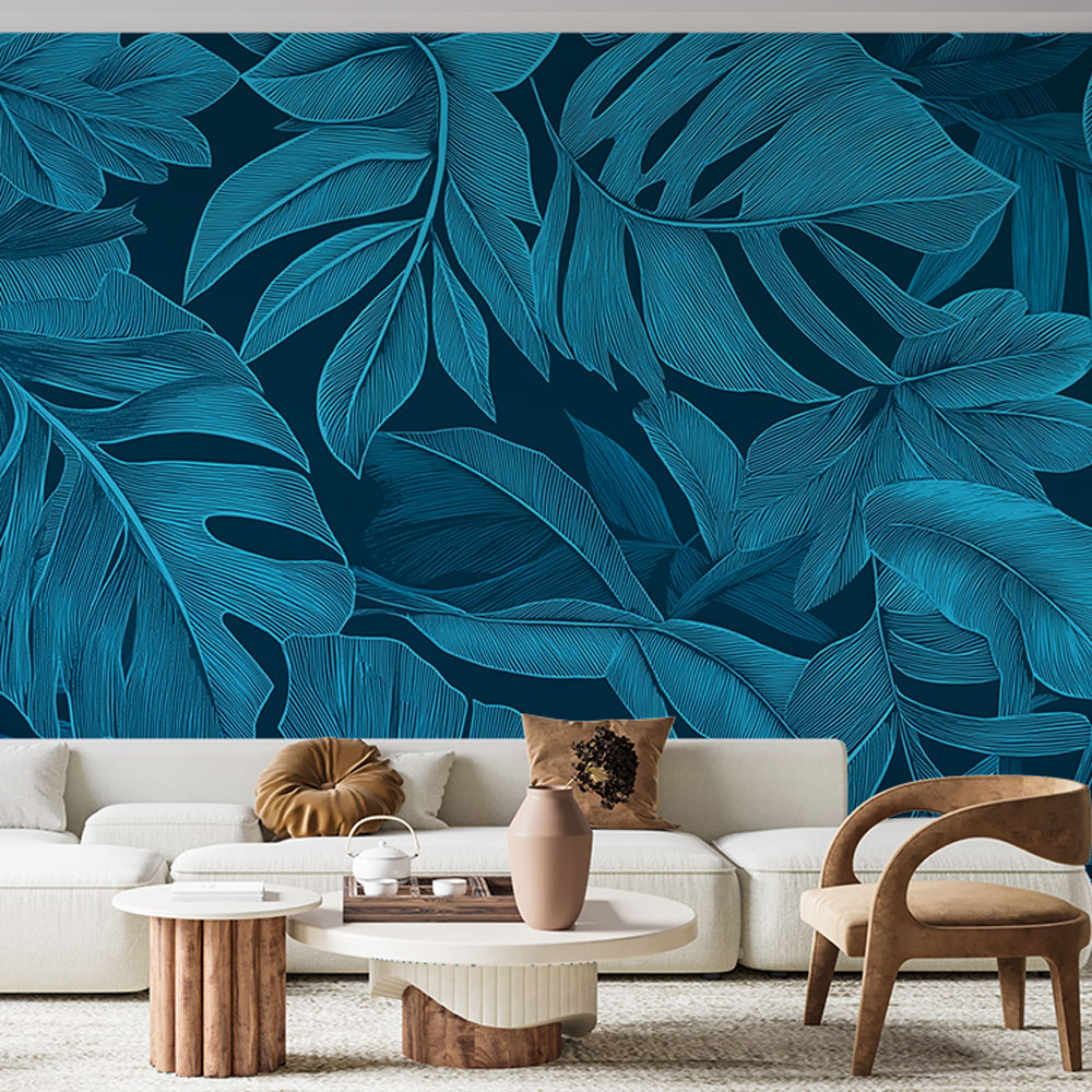 Turquoise Monstera leaf wallpaper bringing tropical charm to a modern living room with white furniture