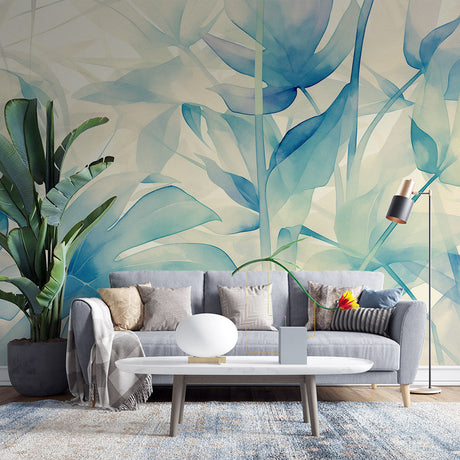 Blue Monstera leaf wallpaper in modern living room setting with white furniture and natural light