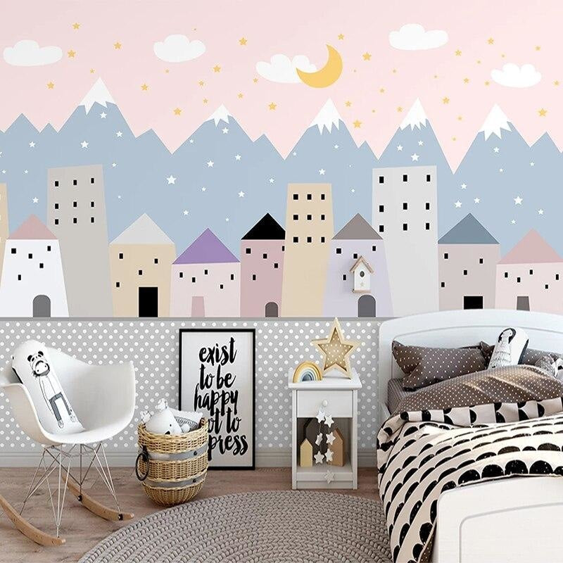 Mountain city wallpaper with pink sky creating a cozy atmosphere in a modern nursery