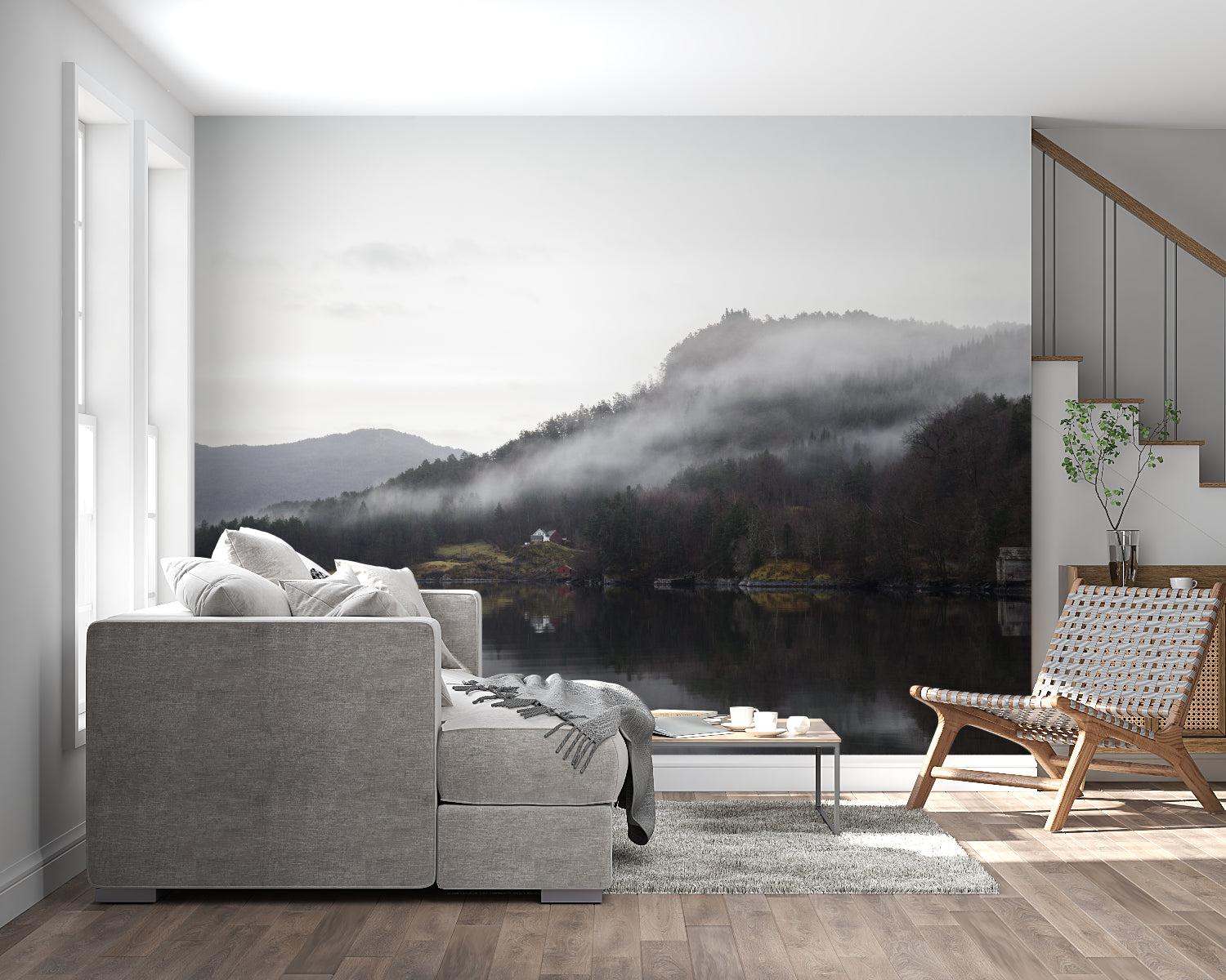 Mountain landscape mural adding depth to dining room with wooden table