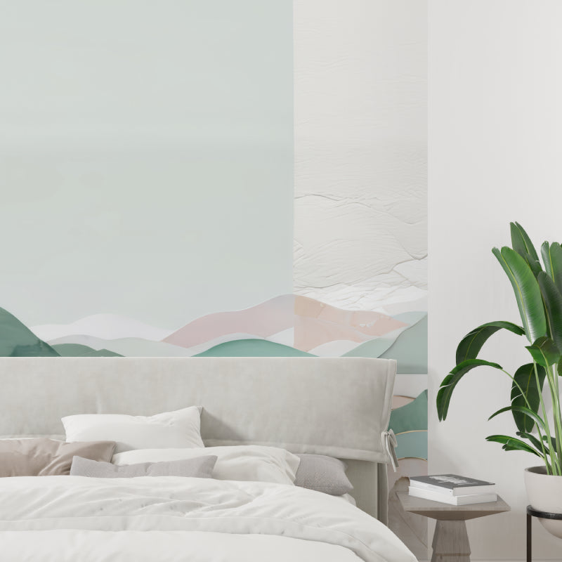 Watercolor mountain mural displayed in a minimal bedroom, showing the peaceful landscape vista