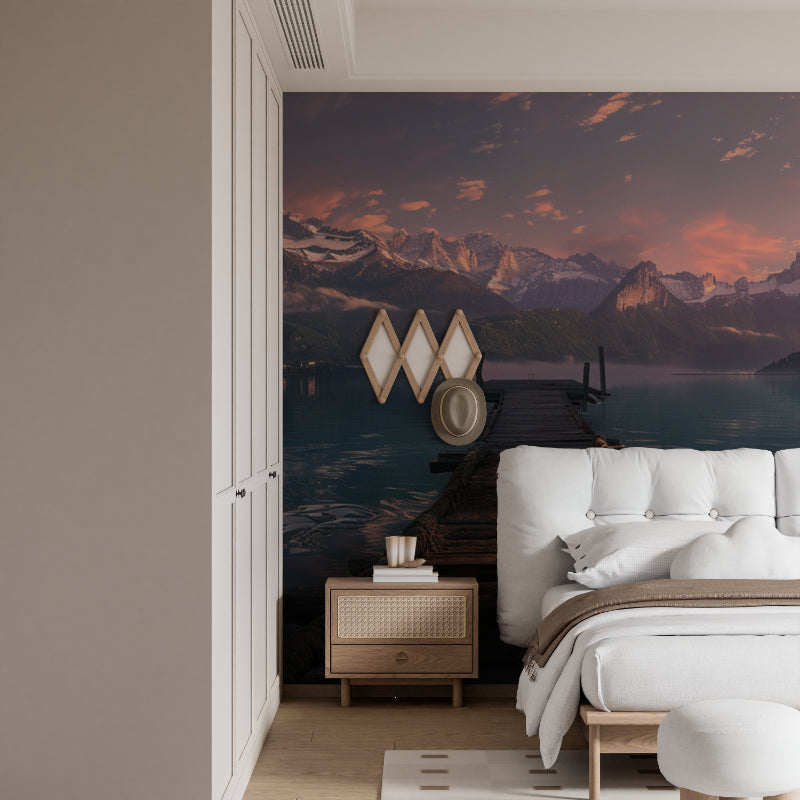 Peaceful bedroom with mountain lake mural featuring dramatic peaks and wooden pier