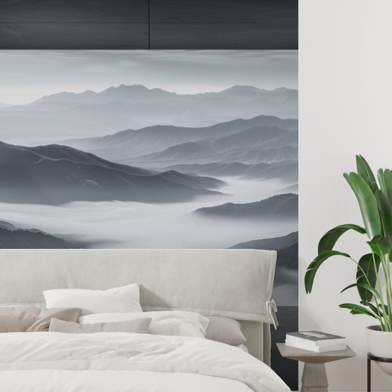 Black and white mountain mural in minimalist bedroom with wooden accents