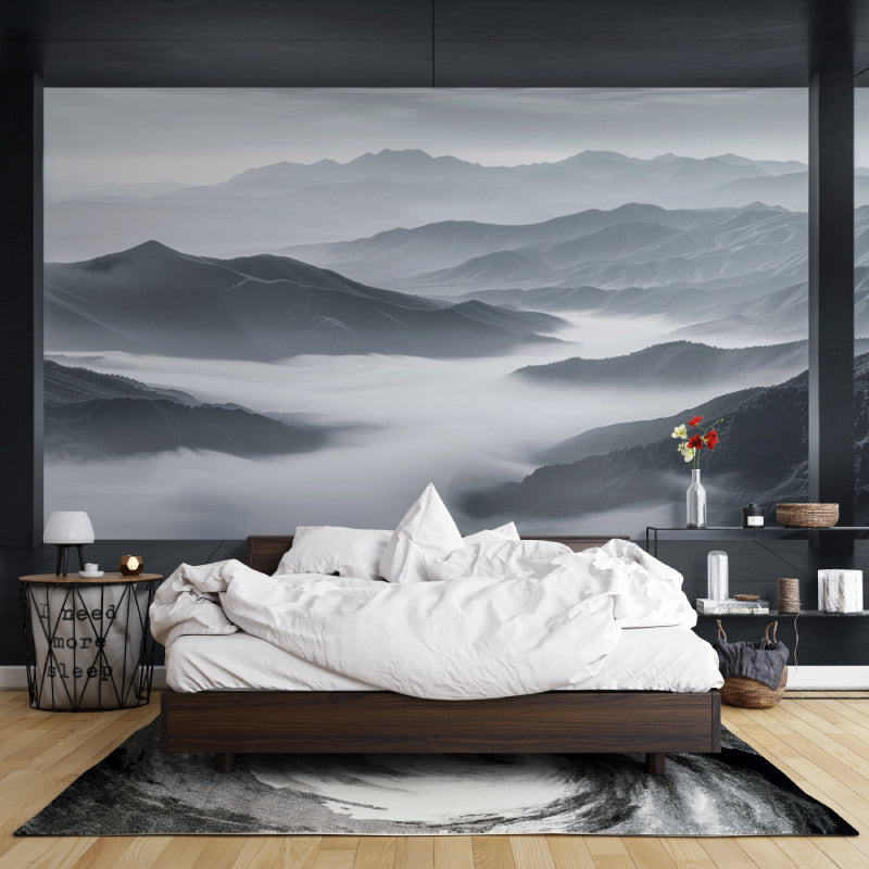 Mountain landscape mural adding depth to dining room with modern furniture