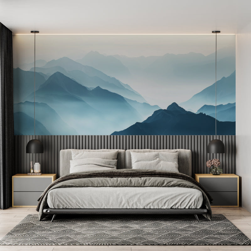 Misty mountain mural wallpaper in peaceful bedroom setting with minimal decor