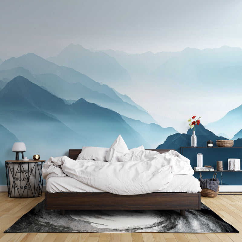 Mountain vista wallpaper in dining room with natural wood furniture