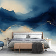 Modern living room featuring Mountain Mural Wallpaper with blue and gold peaks, creating a sophisticated atmosphere