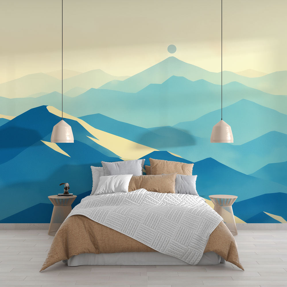 Mountain wall mural showcasing abstract blue peaks in a modern minimalist living room with grey sofa and natural lighting