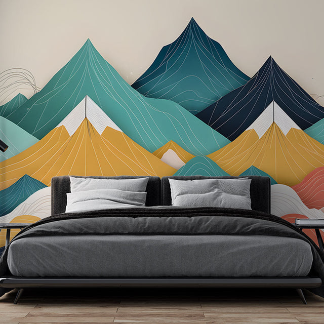 Mountain mural wallpaper with geometric peaks in a modern living room setting, showcasing teal and coral tones
