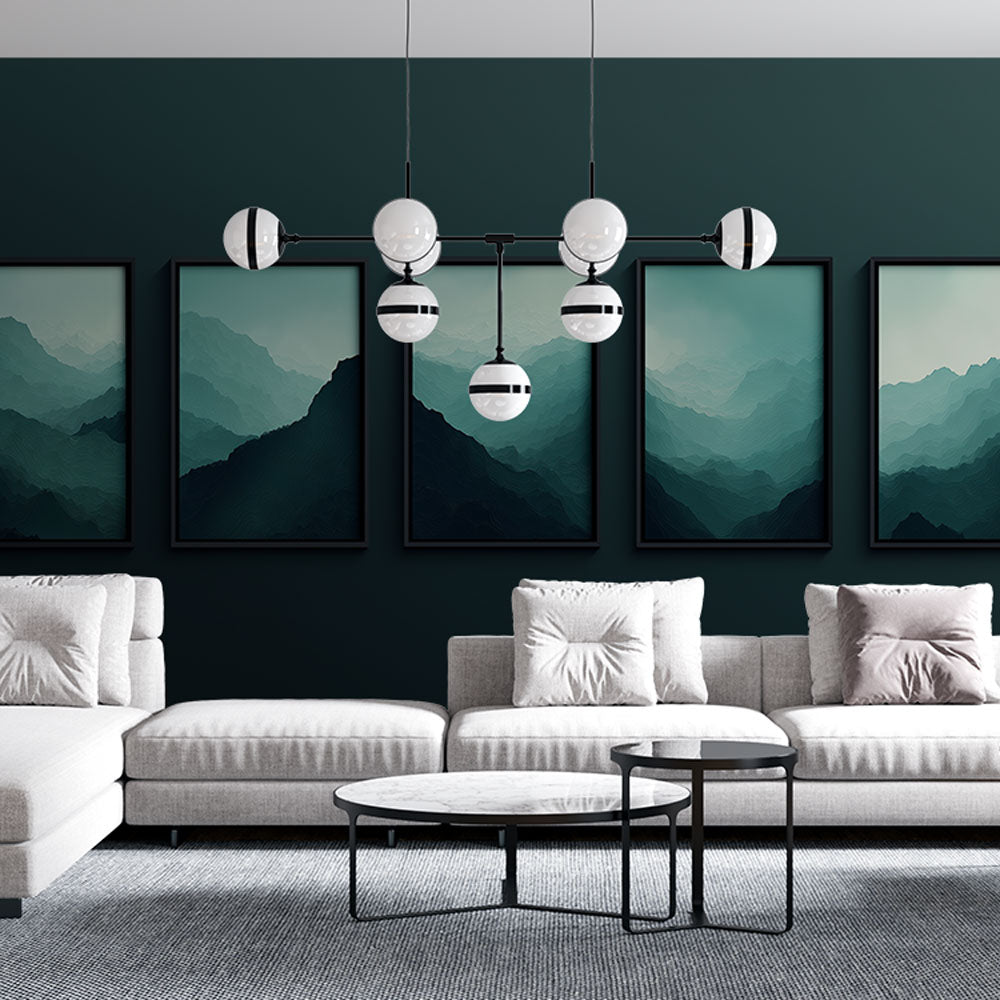 Modern mountain mural wallpaper in bright living room, showing abstract green gradient peaks creating depth and serenity