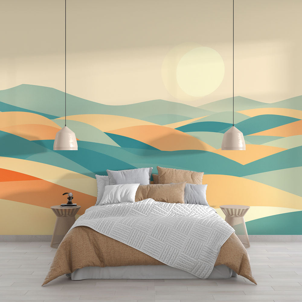 Modern abstract mountain wallpaper with sunset waves shown in a bright living room setting with minimalist furniture