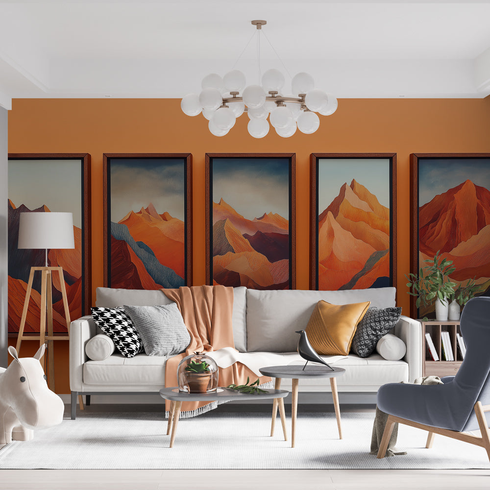 Mountain wallpaper mural in modern living room, terracotta peaks creating warm ambiance against grey sofa and plants