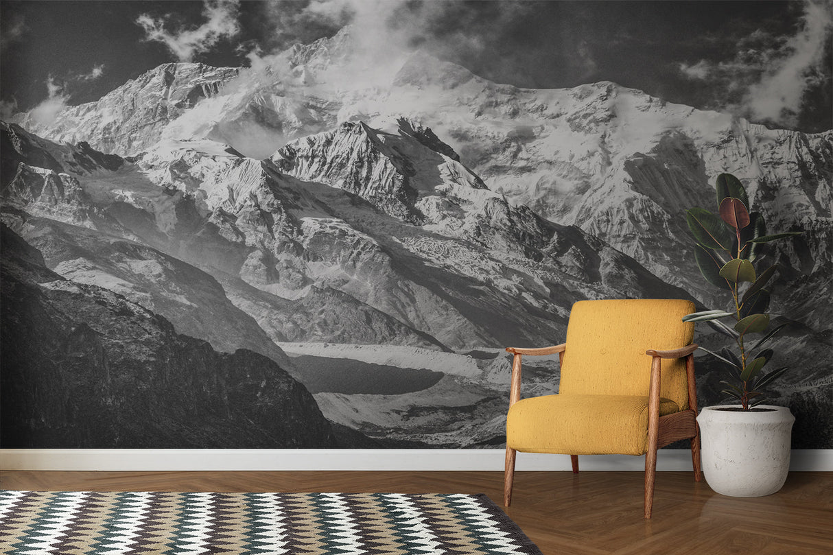 Black and white mountain mural in minimalist bedroom showing scale of peaks
