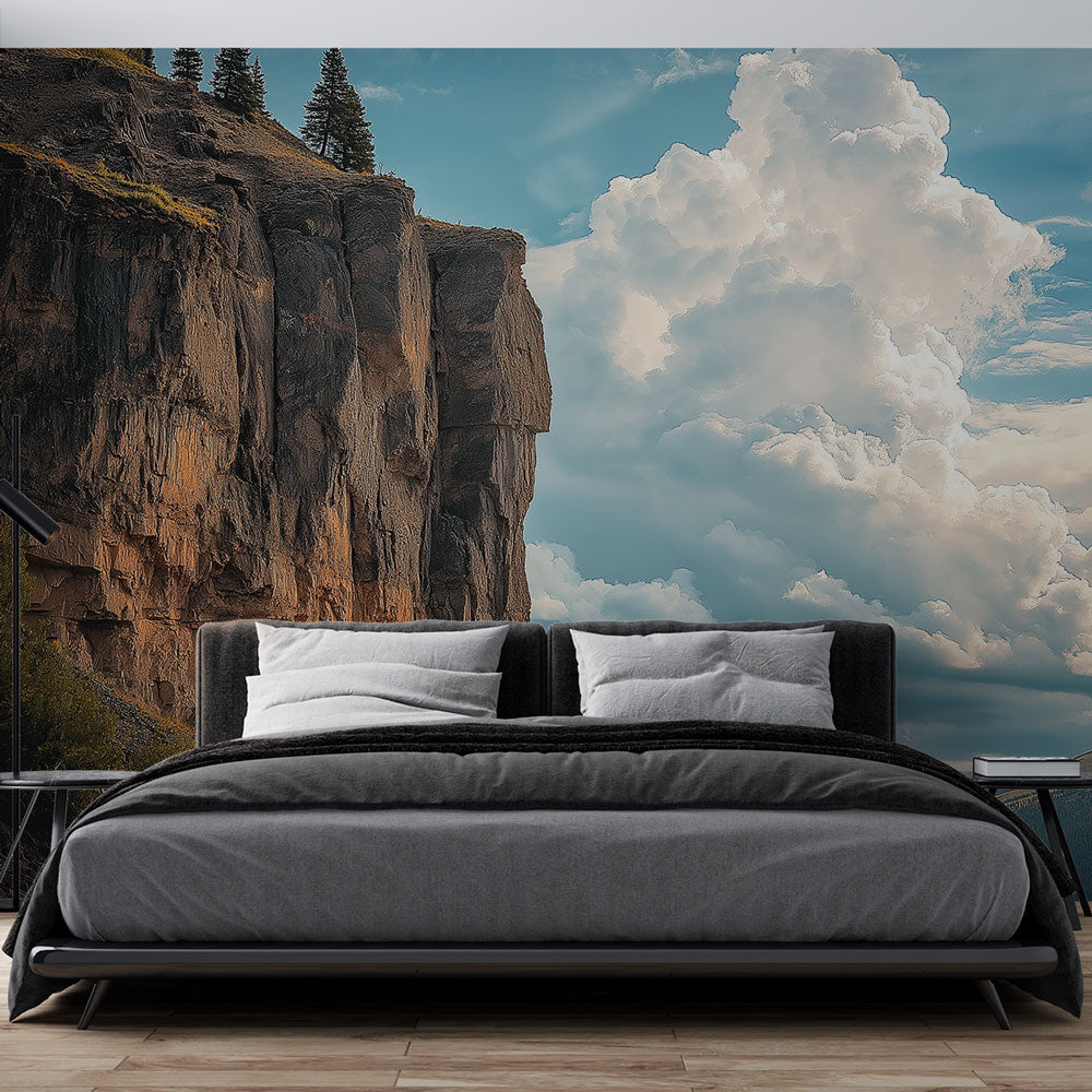 Mountain landscape wallpaper creating a dramatic focal point in a modern living room with minimalist furniture