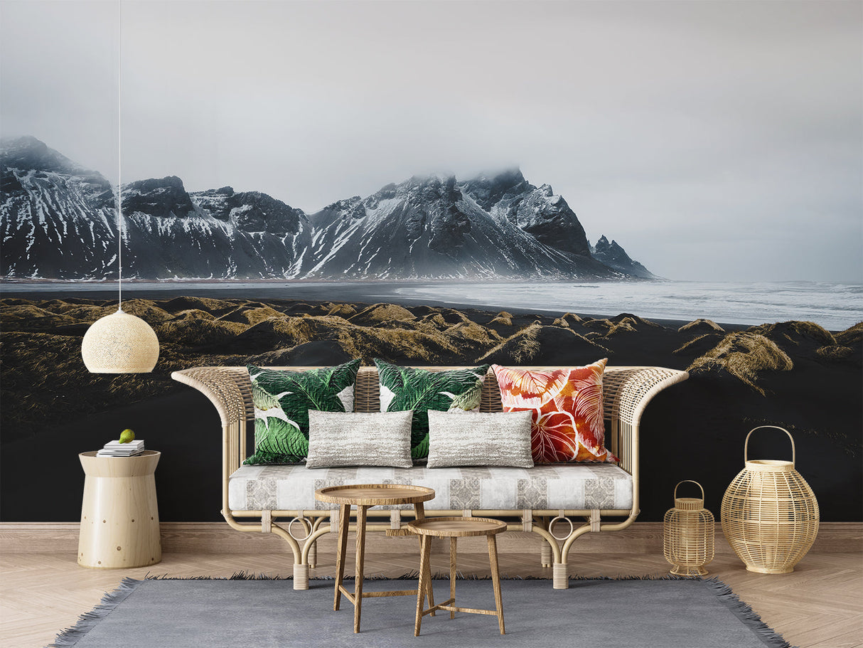 Mountain range wallpaper in dining room with modern chandelier and natural textures