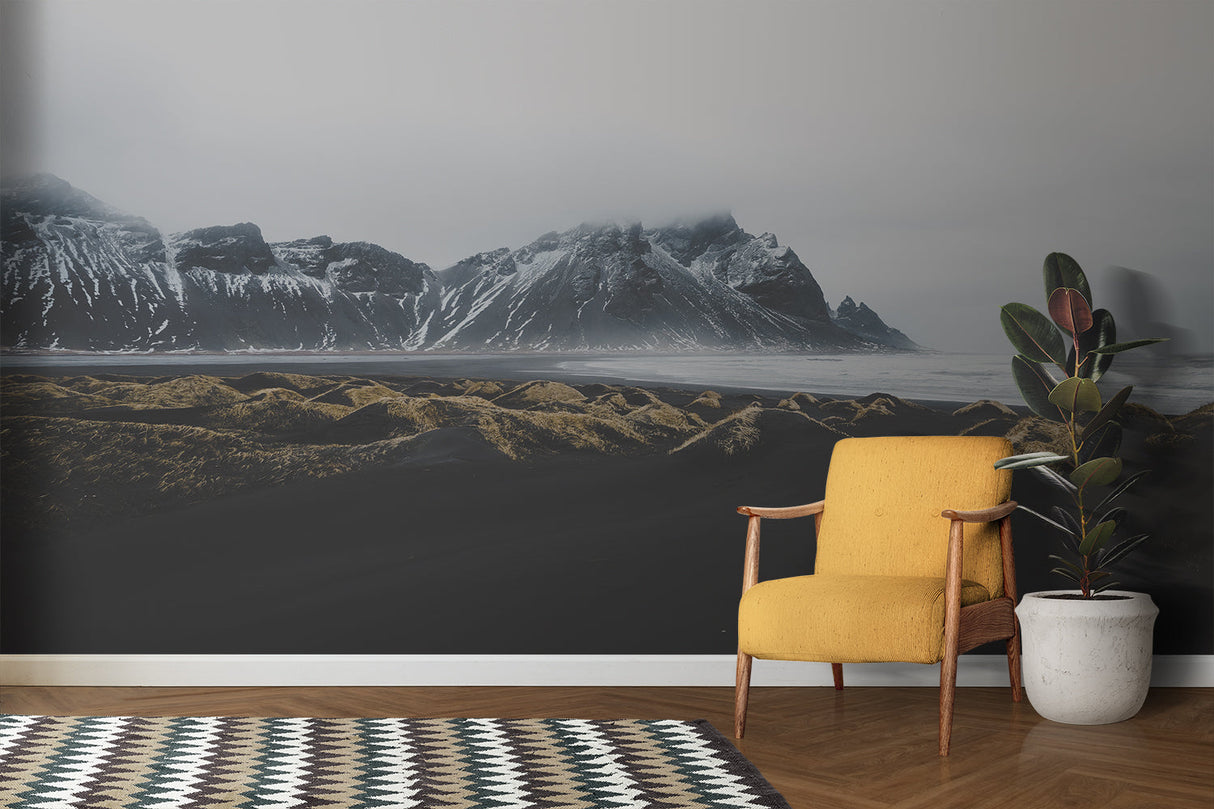 Black and white mountain mural adding depth to hallway with track lighting