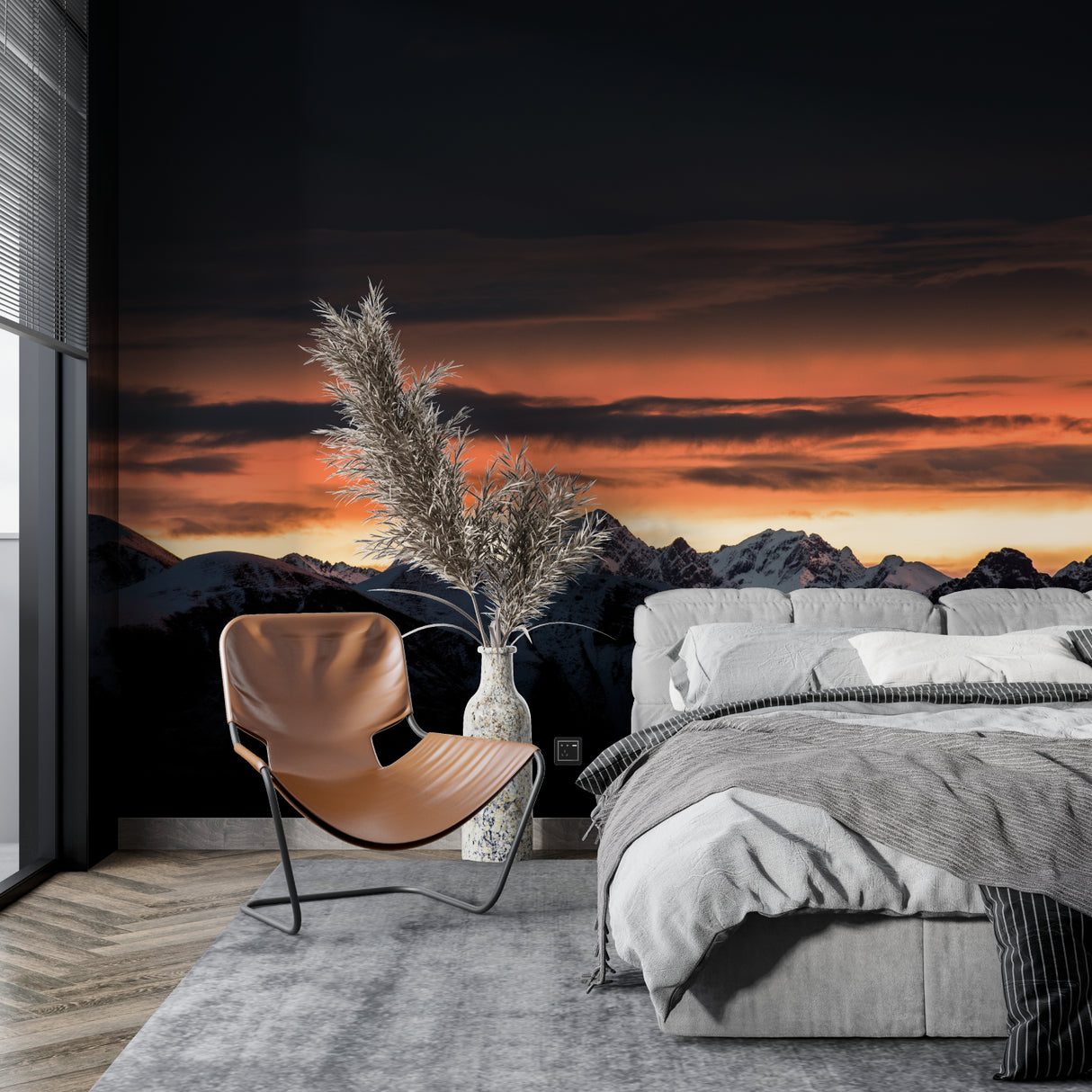 Bedroom with mountain peak wallpaper creating cozy atmosphere with warm sunset tones