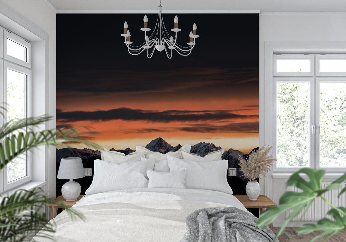 Dining room wall with mountain landscape mural showing snowy peaks at sunset