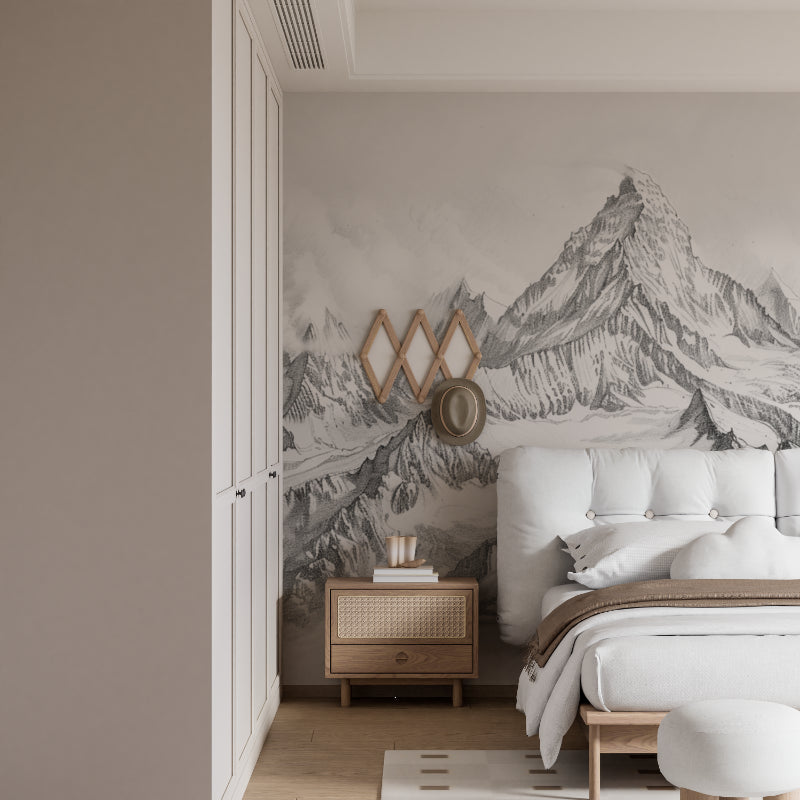 Black and white mountain mural wallpaper in modern minimalist living room creating dramatic focal point