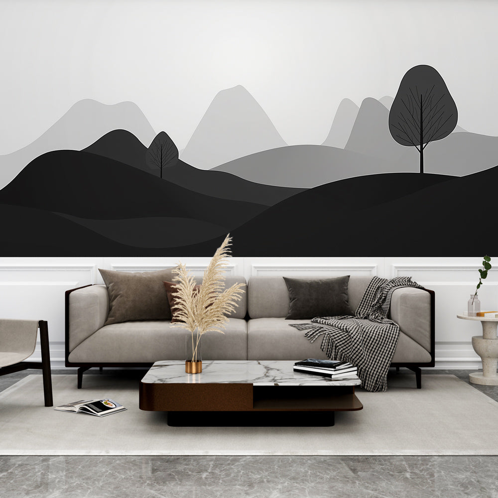 Minimalist mountain wallpaper in modern living room showing black and grey peaks creating depth against white furniture