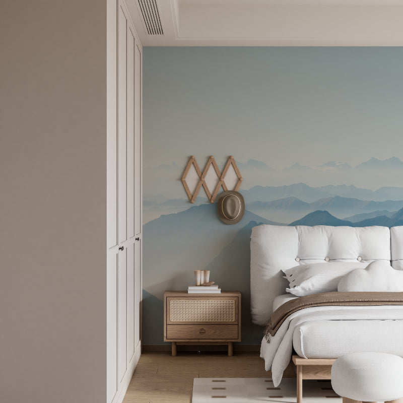 Watercolor mountain mural in home office with desk and minimalist decor