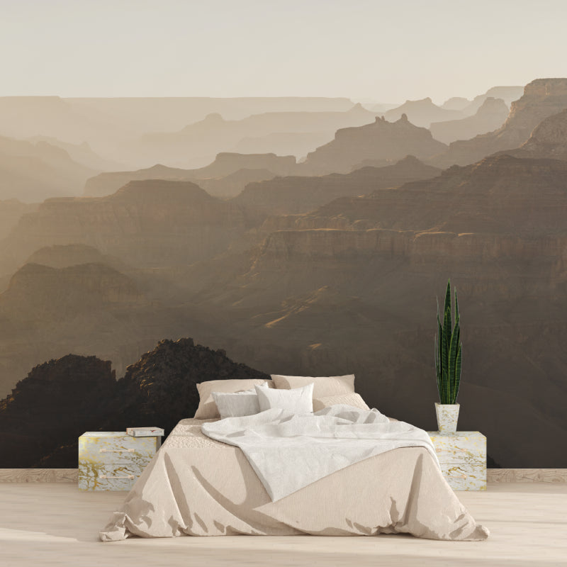 Misty canyon mural creating depth in minimalist bedroom setting