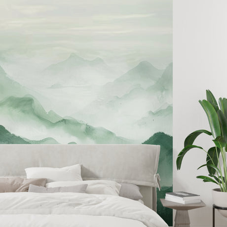 Mountain landscape wallpaper creating depth in a modern living room with minimal furniture