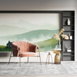 Mountain landscape wallpaper creating depth in a modern living room with natural light