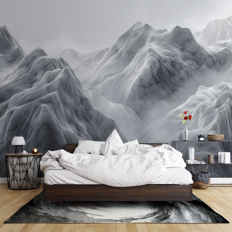 Mountain mural wallpaper creating a calm atmosphere in a modern living room with grey sofa and natural light