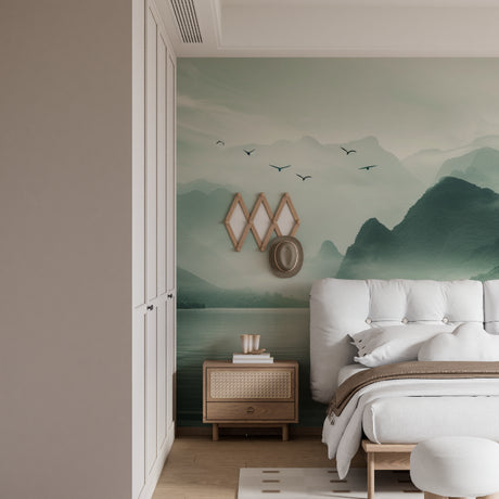 Mountain lake wallpaper in modern living room, showing reflective water and flying birds against misty peaks