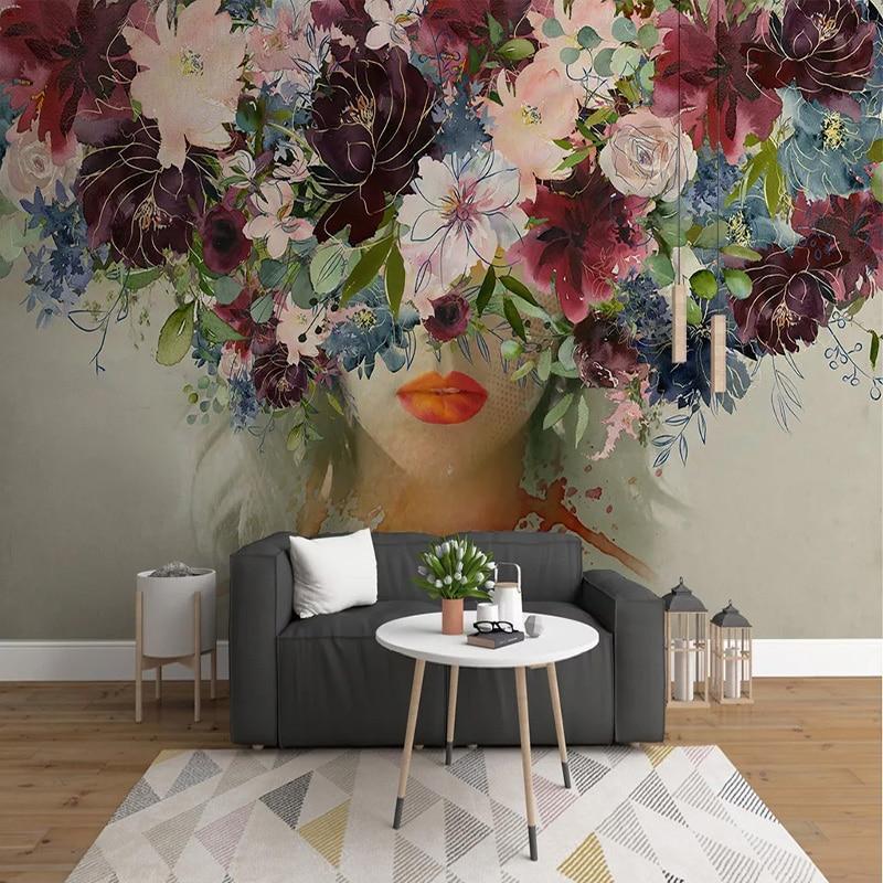 Mountain landscape wallpaper in modern minimalist living room with natural light