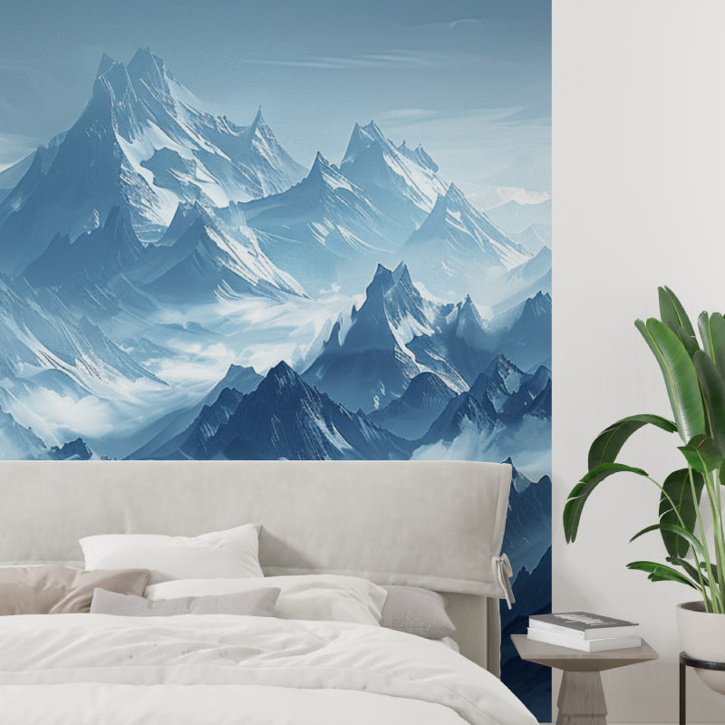 Blue mountain mural wallpaper in minimalist bedroom setting with white bedding