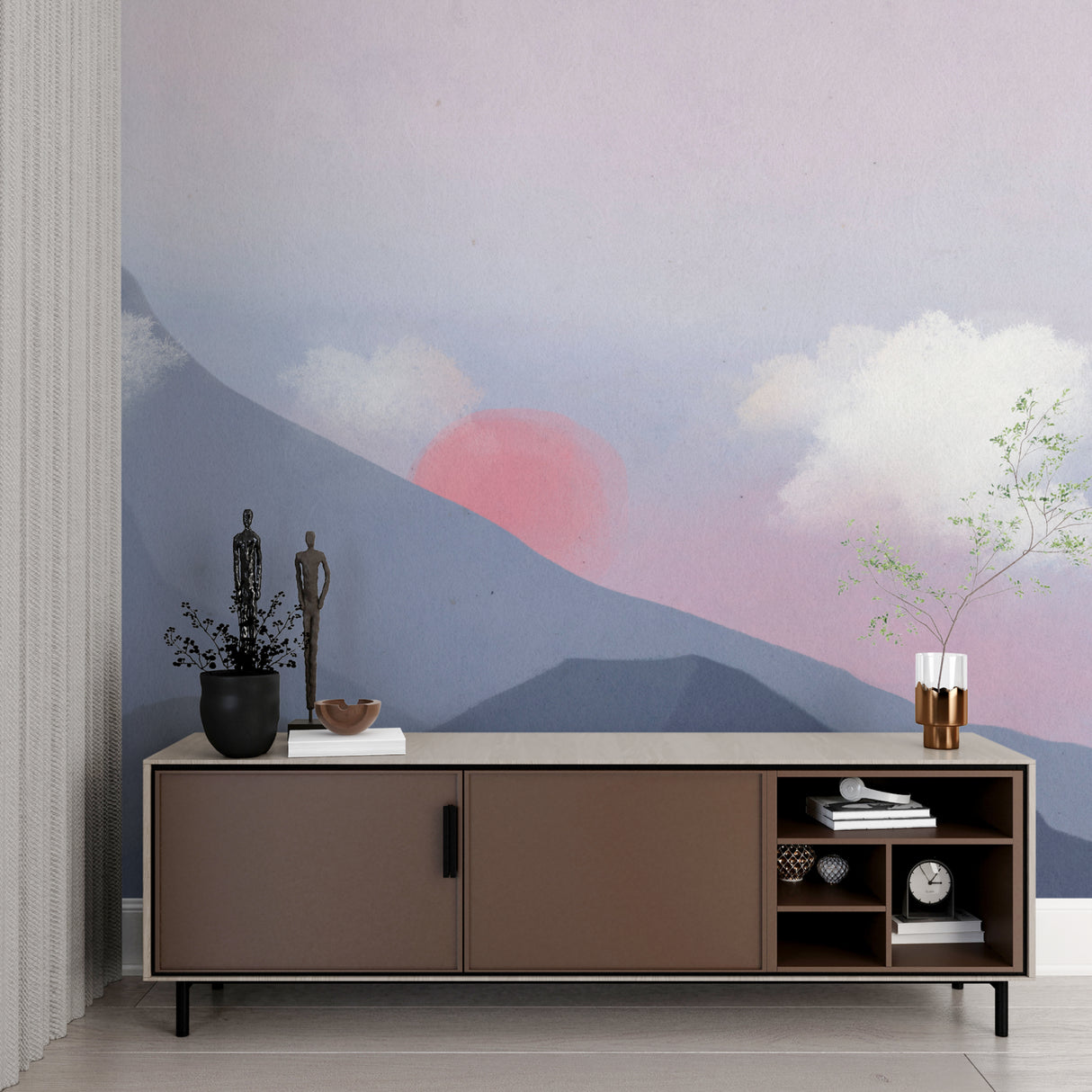 Mountain mural wallpaper in modern living room showing watercolor sunset peaks above grey sofa