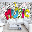 Music graffiti wallpaper bringing urban style to a modern teen bedroom, with colorful street art elements and musical symbols