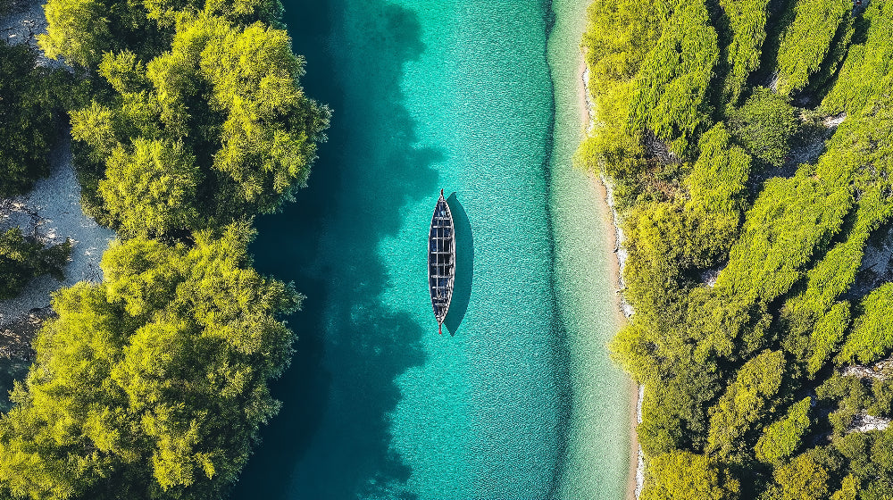 Turquoise river aerial view design file showing intricate water patterns and forest details