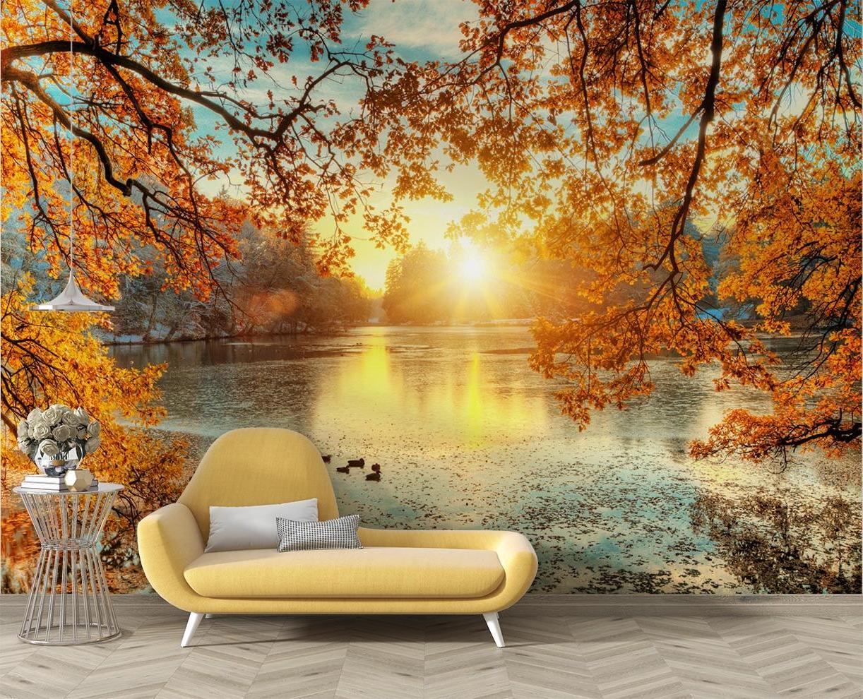Autumn lake sunset wallpaper mural in a modern living room creating a peaceful atmosphere with golden light reflections