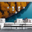 Autumn lake wallpaper mural creating depth in modern living room with orange and blue tones reflecting natural light