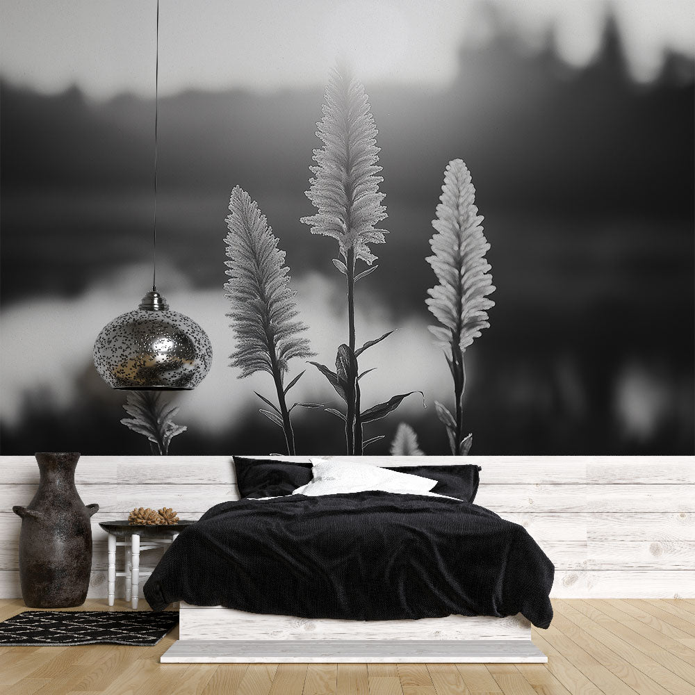 Black and white botanical wallpaper creating a peaceful atmosphere in a modern living room with minimal furniture
