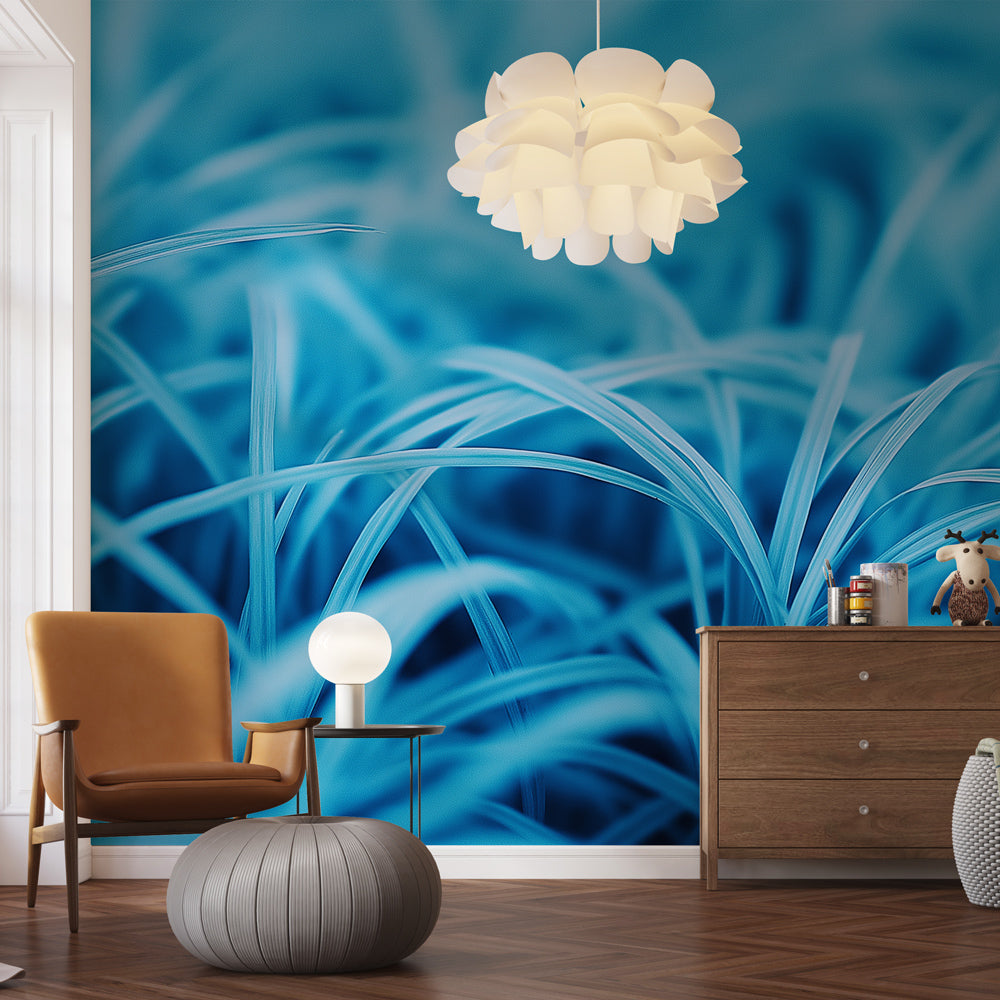 Blue grass abstract wallpaper mural shown in a modern minimalist living room, creating a peaceful atmosphere