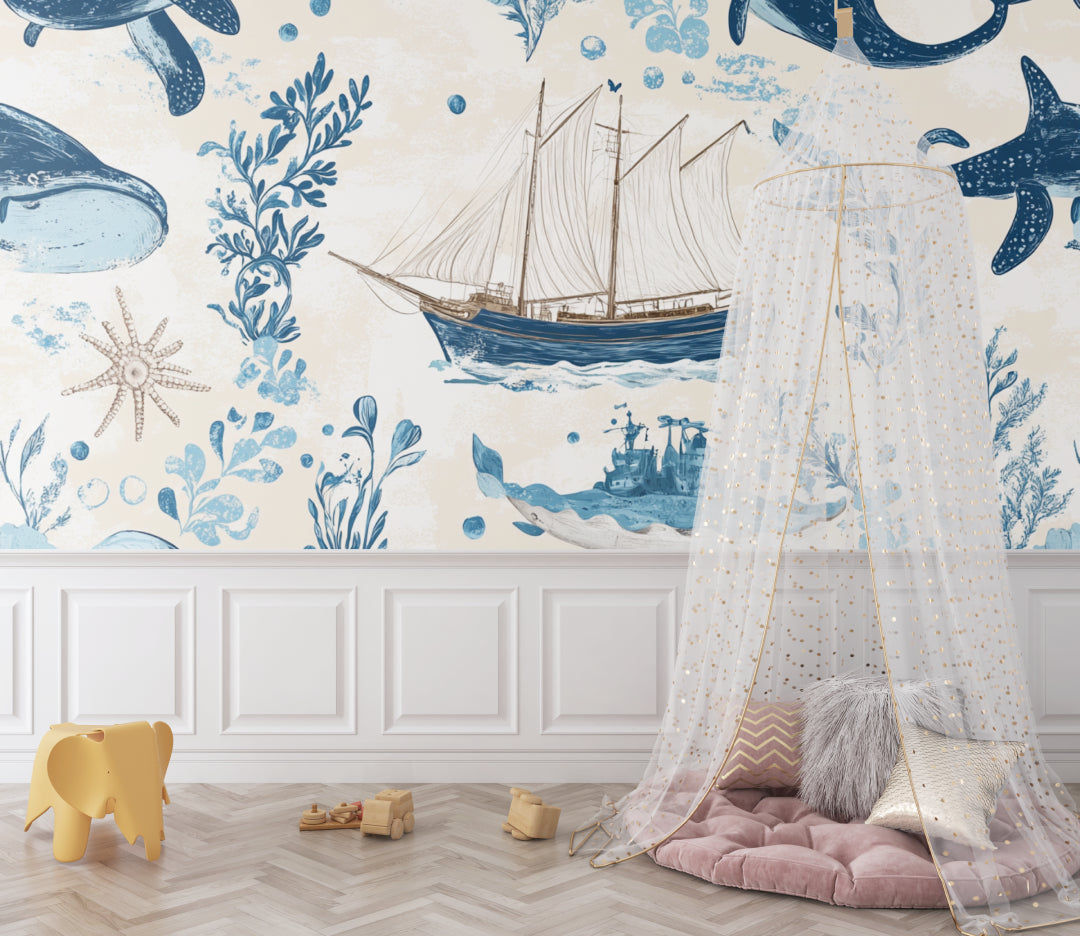 Ocean themed wall mural in a coastal-style kids bedroom with wooden furniture