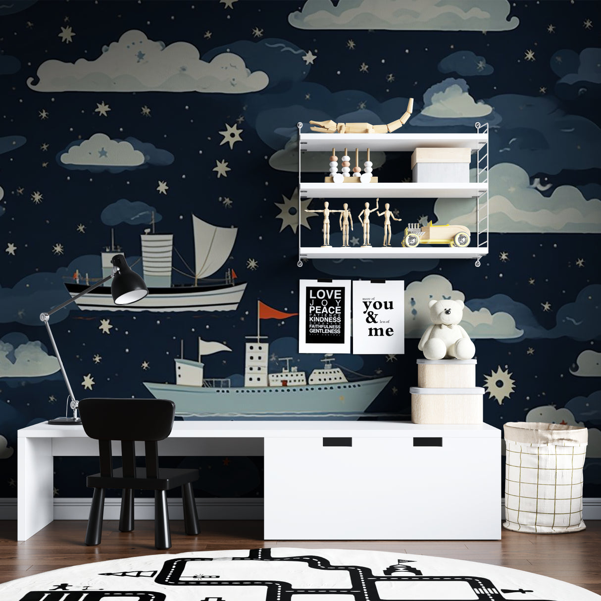 Playroom wall decorated with night sky mural showing sailing ships under starlit sky