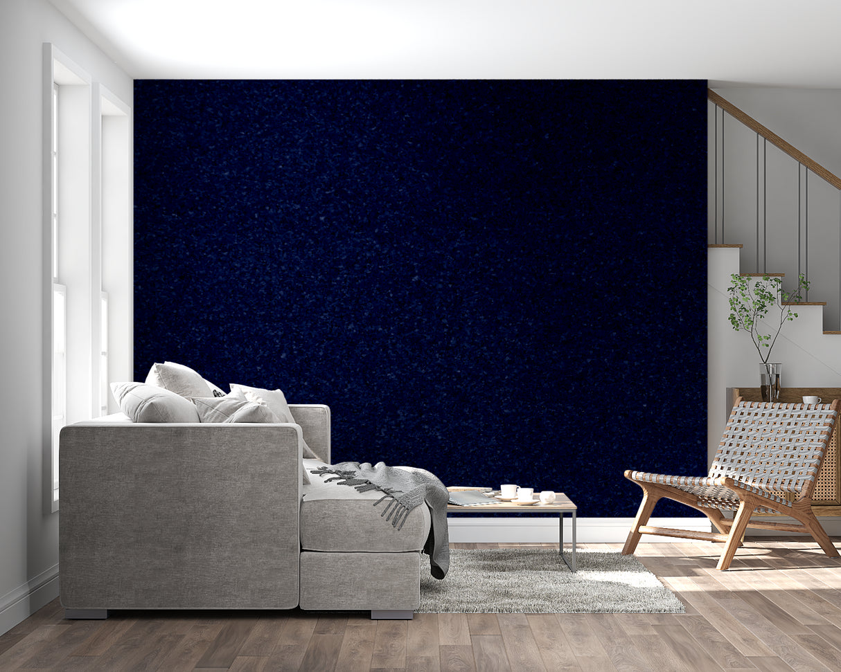 Dark blue galaxy wallpaper showcased in a home office with ambient lighting