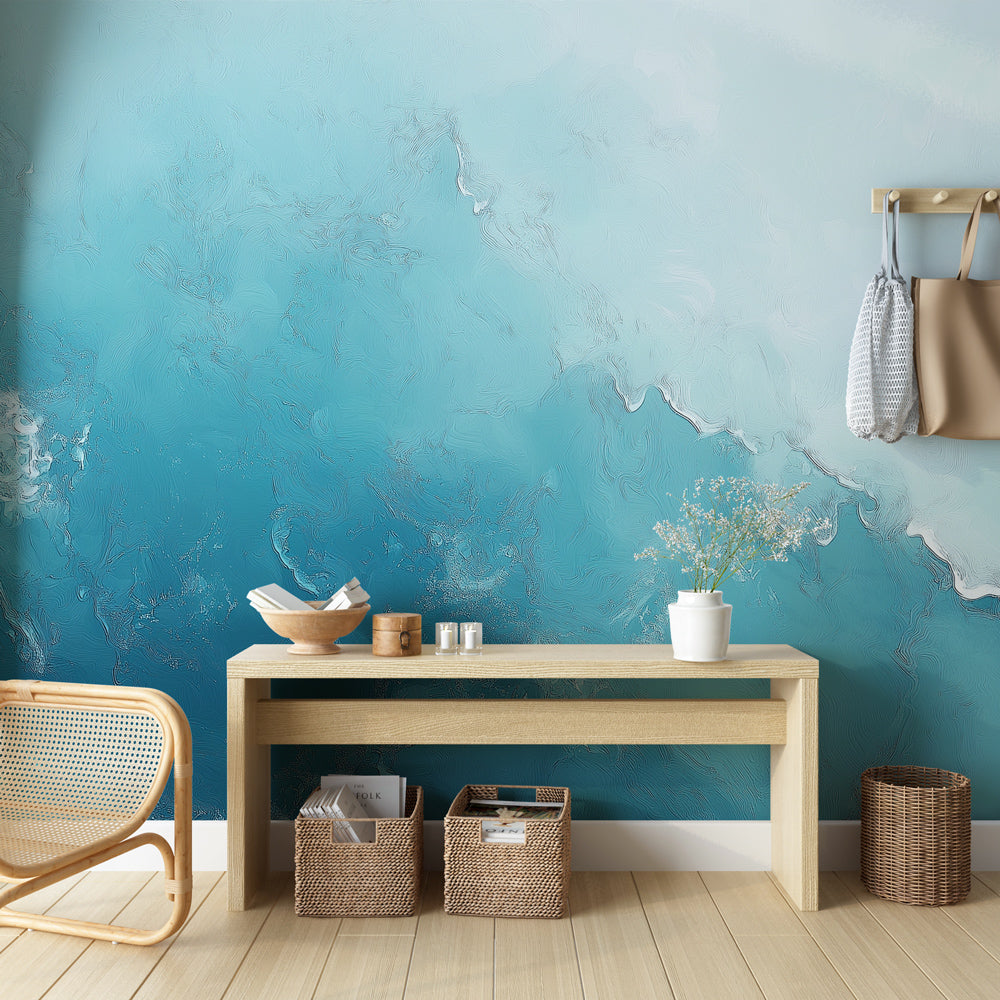 Ocean gradient wallpaper creating a calm atmosphere in a modern living room with natural light highlighting the turquoise tones